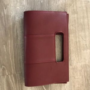 Maroon clutch from Charming Charlie’s. Like new